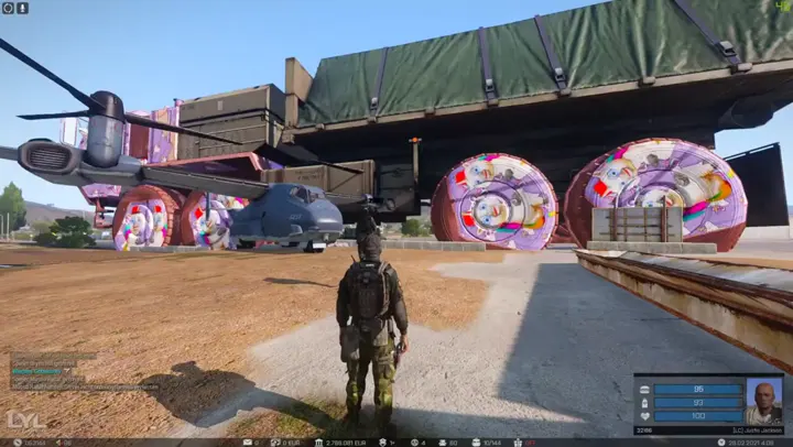 Spieler vor einem Transportflugzeug und großen Kabelrollen auf Altis.